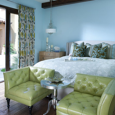 Elegant dark wood floor bedroom photo in Phoenix with blue walls