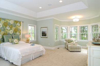 Example of a classic carpeted and beige floor bedroom design in Providence with blue walls