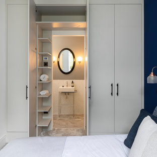 Photo of a small classic guest bedroom in Hertfordshire with carpet, grey floors, blue walls and no fireplace.
