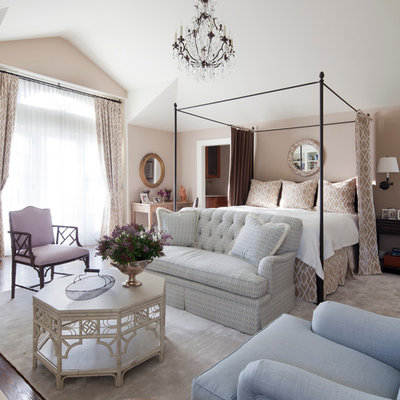 Elegant bedroom photo in New York with beige walls