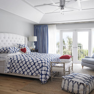 Bedroom - mid-sized transitional master medium tone wood floor bedroom idea in Miami with gray walls and no fireplace