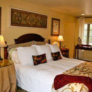 Bedroom - mid-sized mediterranean master carpeted bedroom idea in San Francisco with beige walls and no fireplace