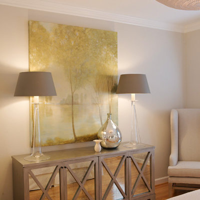 Example of a trendy bedroom design in Raleigh with beige walls