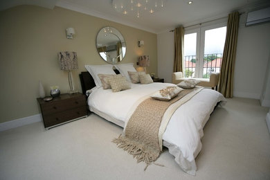 Photo of a modern bedroom in Surrey.