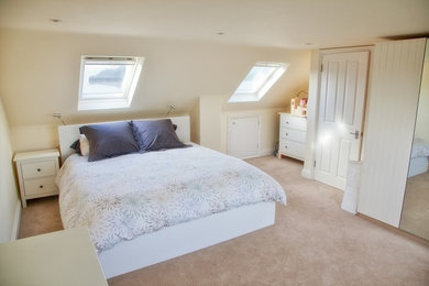 Photo of a large contemporary bedroom in Hertfordshire.