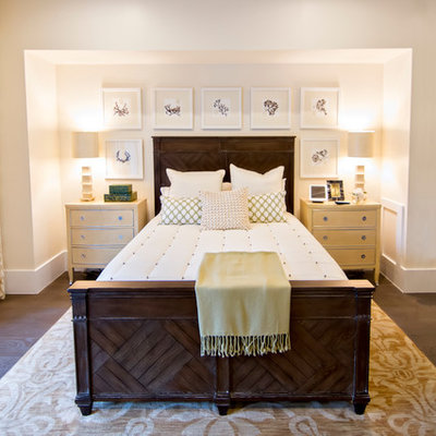 Large island style master dark wood floor and brown floor bedroom photo in Jacksonville with white walls and no fireplace