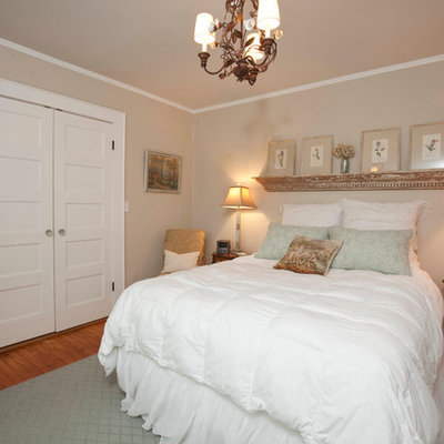 Example of a classic bedroom design in Wilmington with beige walls