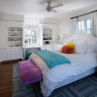 Example of a classic dark wood floor bedroom design in Phoenix with white walls