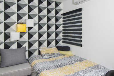 Example of a trendy bedroom design in Tel Aviv