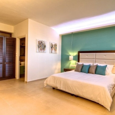Bedroom - contemporary bedroom idea in Other with green walls
