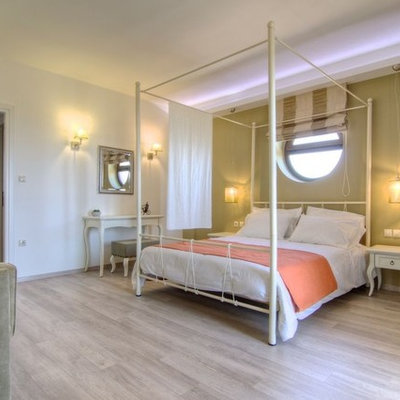 Inspiration for a contemporary bedroom remodel in Other with yellow walls