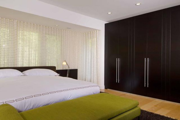 Modern Bedroom by Hughes Construction, Inc