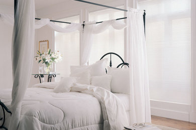 Example of a cottage chic bedroom design in Other