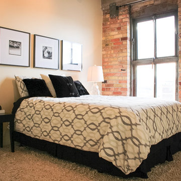 Industrial Condo Bedroom with Exposed Brick