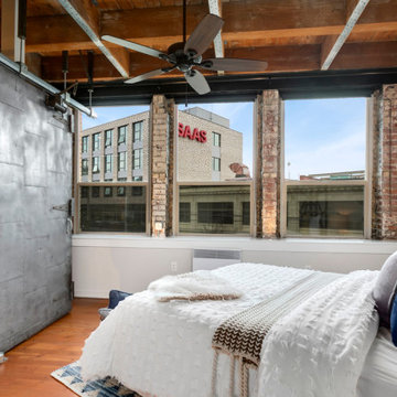 Industrial Condo With Transitional Style Decor