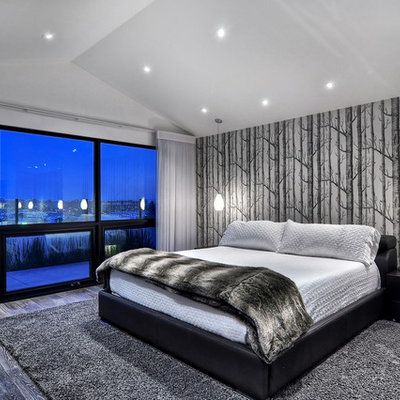 Bedroom - mid-sized contemporary master light wood floor bedroom idea in Orange County with white walls, a standard fireplace and a metal fireplace