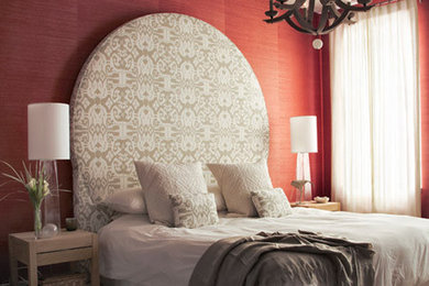Trendy master bedroom photo in New York with red walls