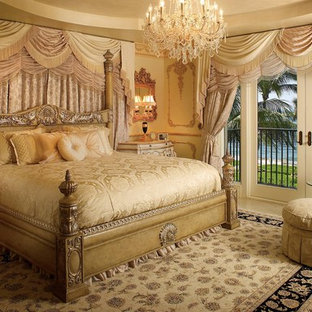 Example of a classic bedroom design in Miami with beige walls