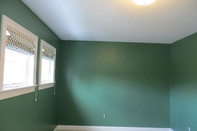 Bedroom photo in Providence with green walls