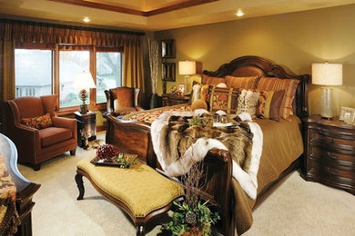 Example of a large classic master carpeted and beige floor bedroom design in Other with no fireplace