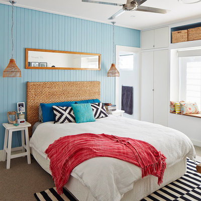 Bedroom - large coastal carpeted bedroom idea in Sydney with blue walls