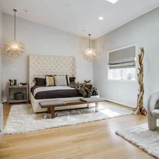 Inspiration for a large contemporary master bedroom remodel in Dallas with white walls and no fireplace