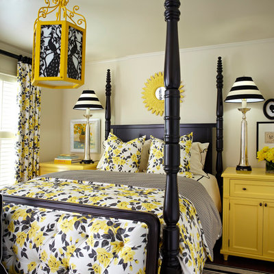 Example of a mid-sized classic guest carpeted bedroom design in Little Rock with beige walls and no fireplace