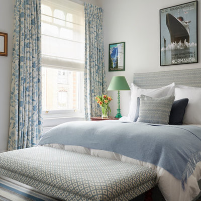 Large eclectic master carpeted bedroom photo in London with white walls