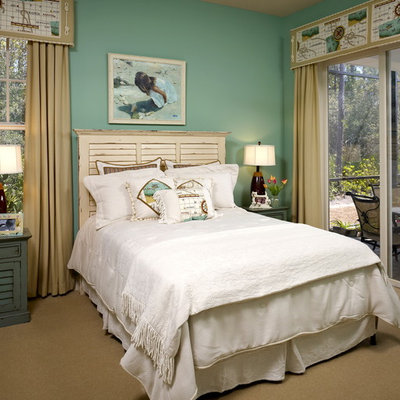 Bedroom - mid-sized tropical guest carpeted and beige floor bedroom idea in Jacksonville with green walls and no fireplace