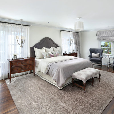 Bedroom - large traditional guest dark wood floor bedroom idea in San Francisco with white walls