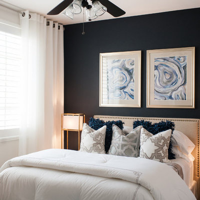 Small transitional guest carpeted bedroom photo in Las Vegas with blue walls