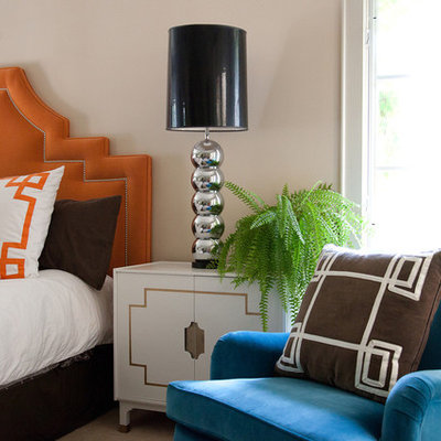 Example of a minimalist bedroom design in Los Angeles with beige walls