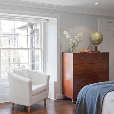 Bedroom - eclectic dark wood floor bedroom idea in Other with gray walls