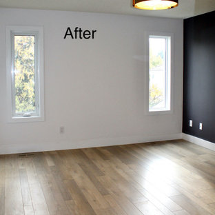 Foto de dormitorio principal, moderno, grande, con paredes blancas, suelo vinílico y suelo beige