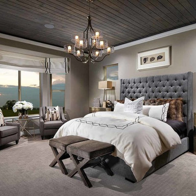 Example of a transitional master bedroom design in Denver with gray walls and no fireplace