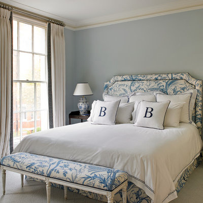 Inspiration for a timeless carpeted bedroom remodel in London with blue walls