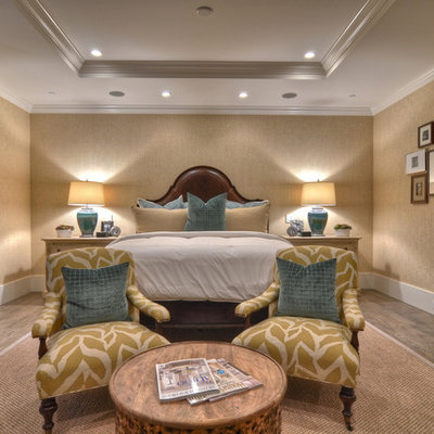 Inspiration for a transitional light wood floor bedroom remodel in Orange County with beige walls and no fireplace