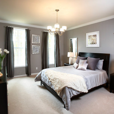 Inspiration for a mid-sized transitional master carpeted bedroom remodel in New York with gray walls and no fireplace