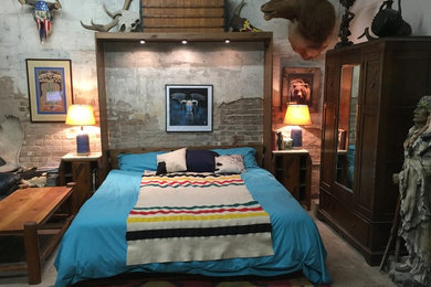Bedroom - small rustic loft-style bedroom idea in Austin
