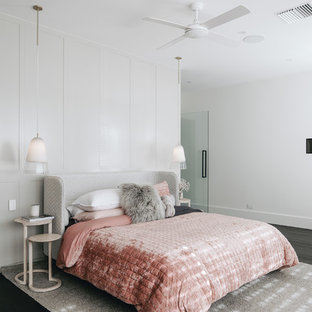 Inspiration for a contemporary bedroom in Adelaide with white walls, dark hardwood floors and black floor.