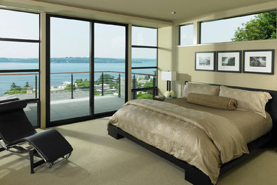 Example of a trendy carpeted bedroom design in Seattle with beige walls