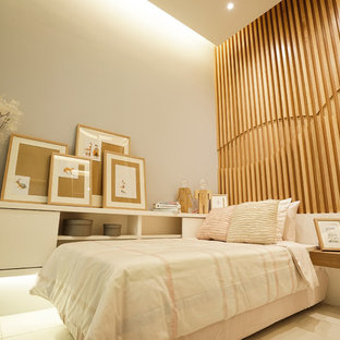 Imagen de habitación de invitados nórdica, pequeña, sin chimenea, con paredes grises y suelo de baldosas de porcelana