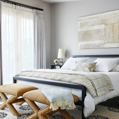 Bedroom - transitional dark wood floor and brown floor bedroom idea in Los Angeles with gray walls