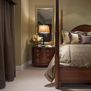 Elegant carpeted bedroom photo in Orange County with green walls