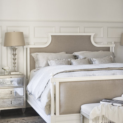 Inspiration for a large timeless master dark wood floor bedroom remodel in Other with beige walls
