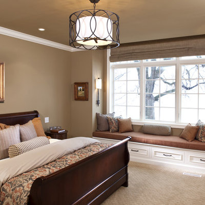 Inspiration for a timeless carpeted bedroom remodel in Minneapolis with brown walls