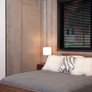 Example of a mid-sized trendy guest bedroom design in Minneapolis with gray walls and no fireplace