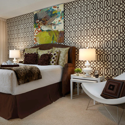 Inspiration for a large contemporary master carpeted bedroom remodel in Miami with brown walls