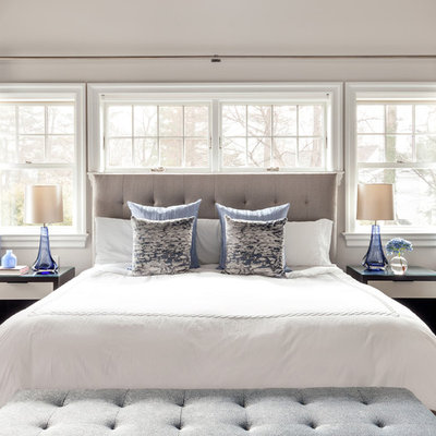 Inspiration for a transitional master dark wood floor bedroom remodel in New York with beige walls