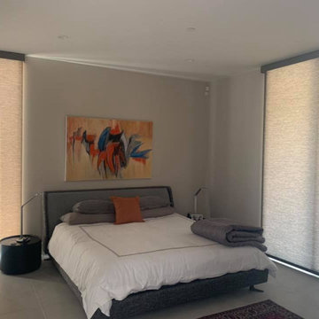 Large Motorized Roller Shades in Bedroom